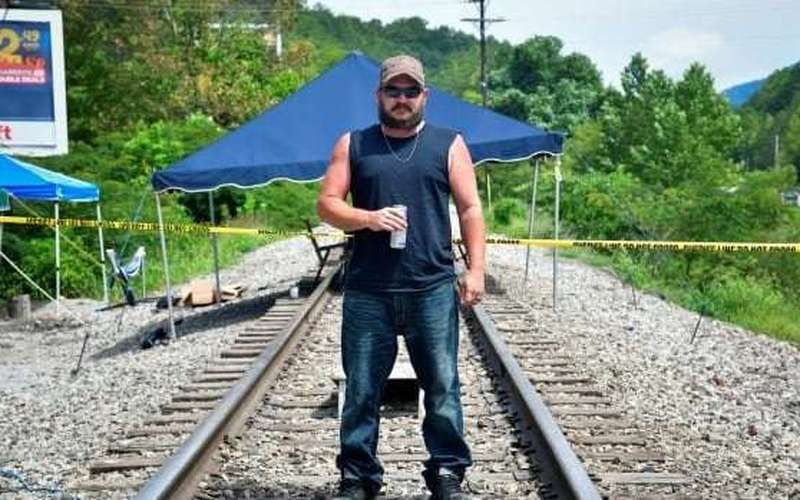 image for Unpaid Kentucky coal miners have been blocking a train track for 3 weeks