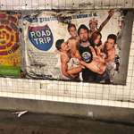 image for Someone peeled off 20 years worth of subway ads to reveal this Road Trip poster, circa 2000.