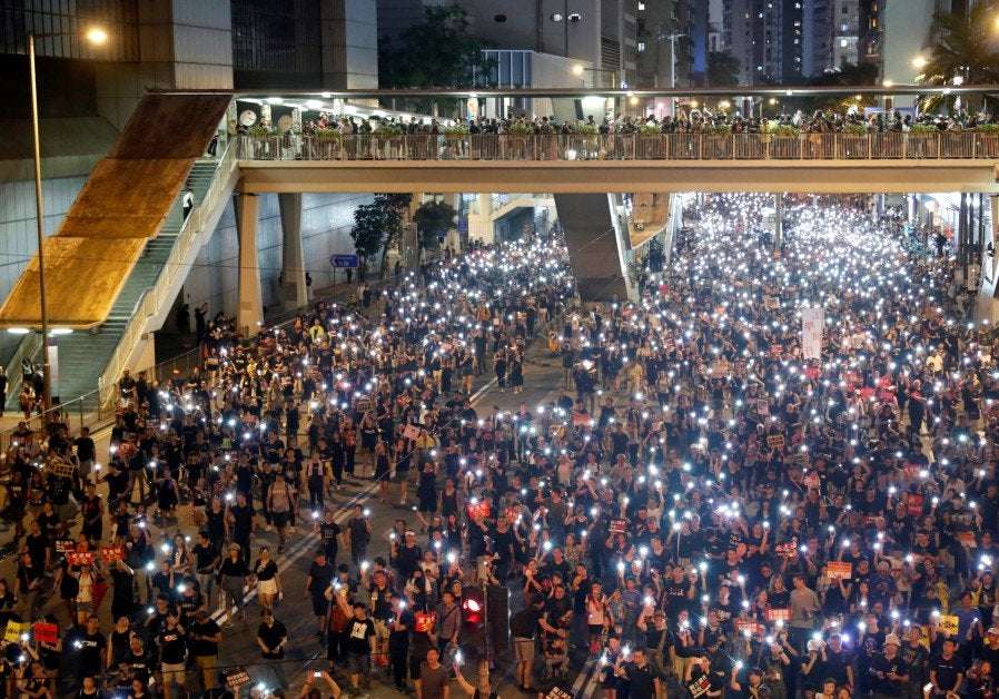 image for Hong Kong protesters hit pause to mark 9/11 attacks