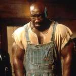 image for In â€œthe Green Mileâ€� they used creative camera angles and tricks gives the illusion of Michael Clark Duncanâ€™s height. Heâ€™s actually only an inch taller than David Morse (left)