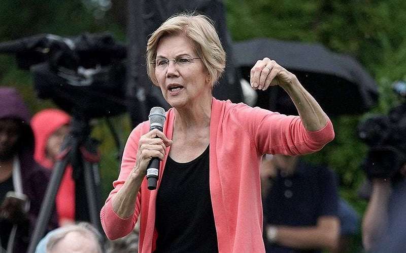 image for Warren: Kavanaugh 'should be impeached' just like Trump