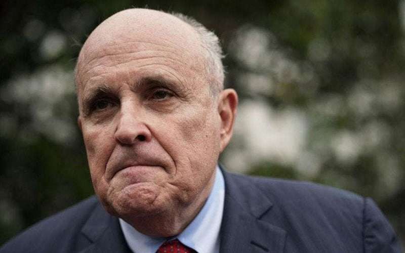 image for Giuliani says 'of course' he asked Ukraine to look into Biden seconds after denying it