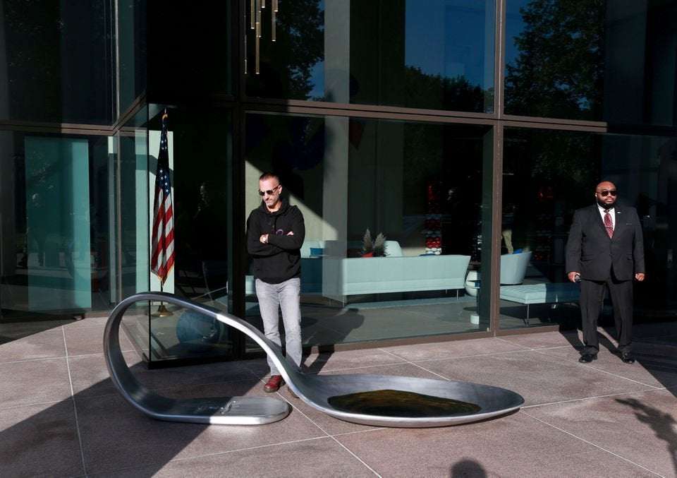 image for Protestor dropped an 800-pound opioid spoon in front of the Johnson & Johnson HQ