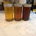 image for The different colors of the honey I harvested this year: spring, summer and fall.