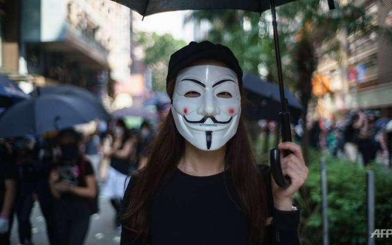 image for Hong Kong protesters embrace 'V for Vendetta' Guy Fawkes masks