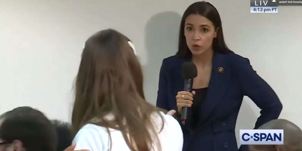 image for A protestor who called for Americans to 'eat babies' to fight climate change at AOC's town hall was revealed as a member of a pro-Trump fringe group
