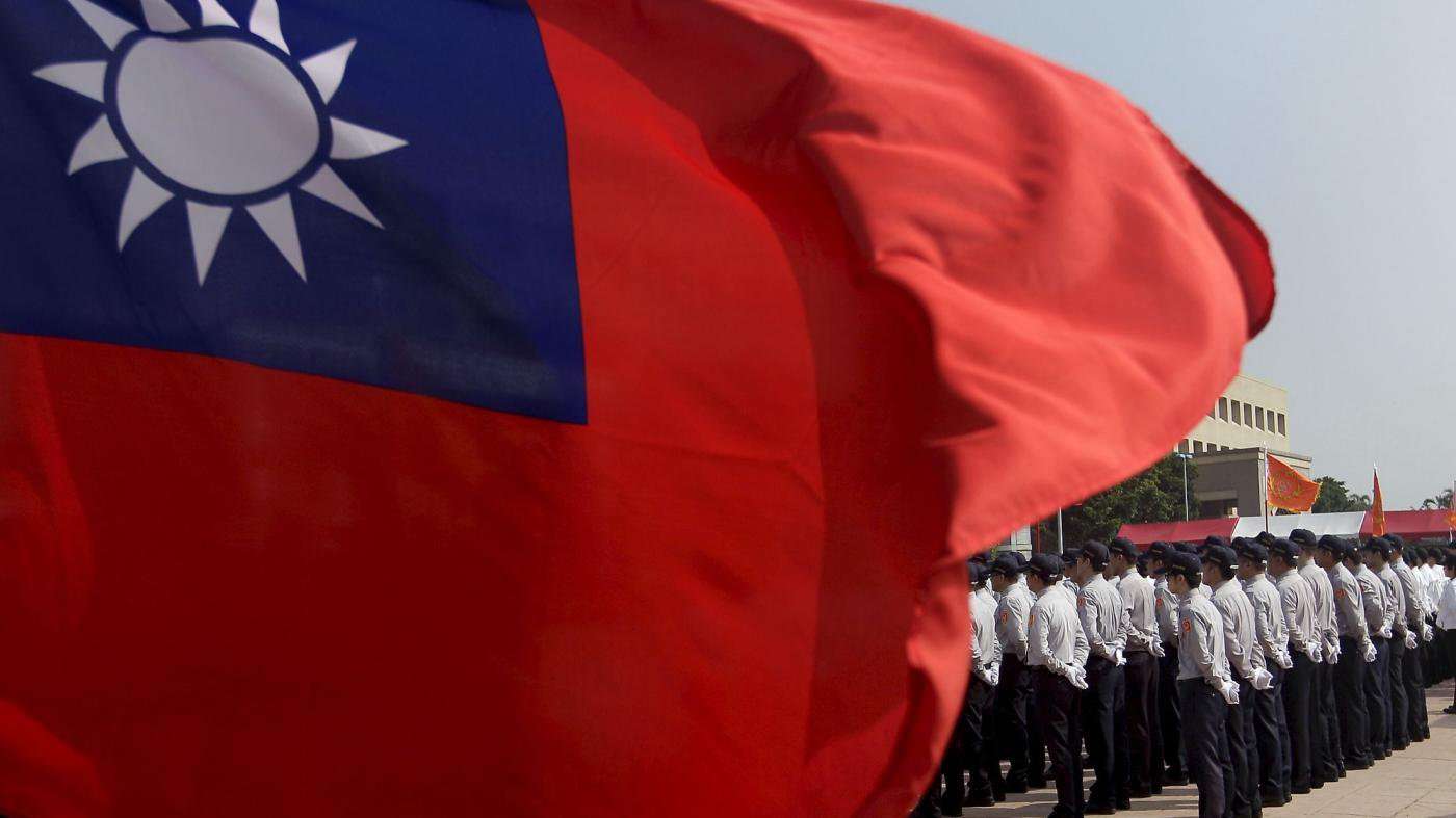 image for Apple bows to China by censoring Taiwan flag emoji
