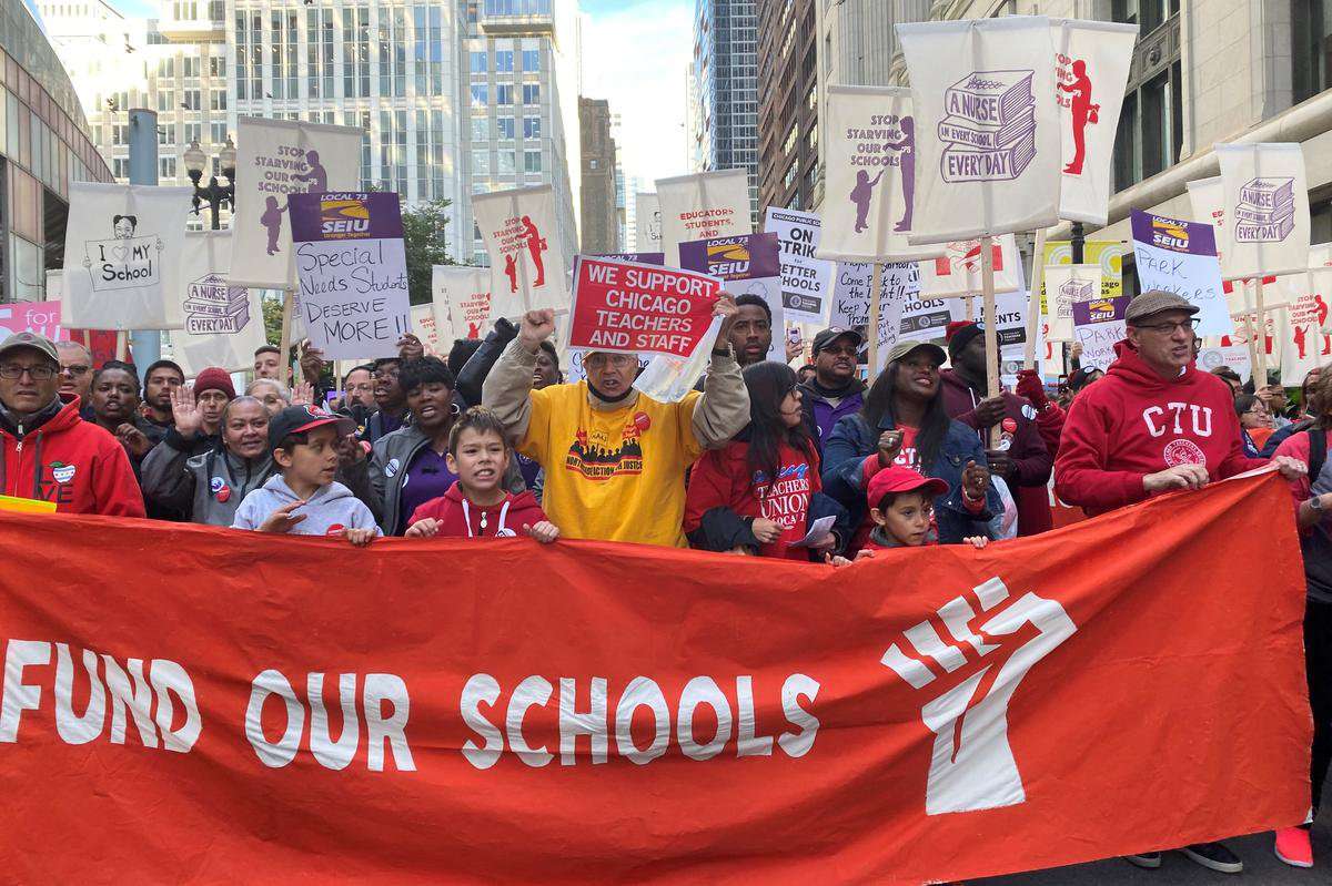 image for Chicago teachers picket across the city on first day of strike