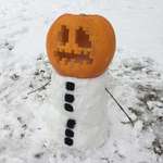 image for For some God Forsaken reason it snowed in Utah yesterday. My friend took he's already made Halloween pumpkin and built a snow golem.