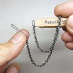 image for a chain link carved from pencil lead