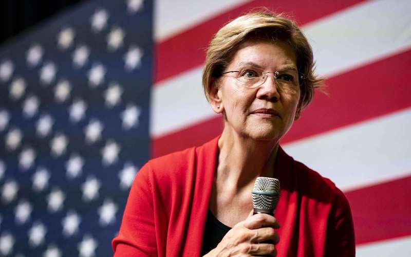 image for Elizabeth Warren slams Twitter for a policy that bans ads from groups fighting climate change