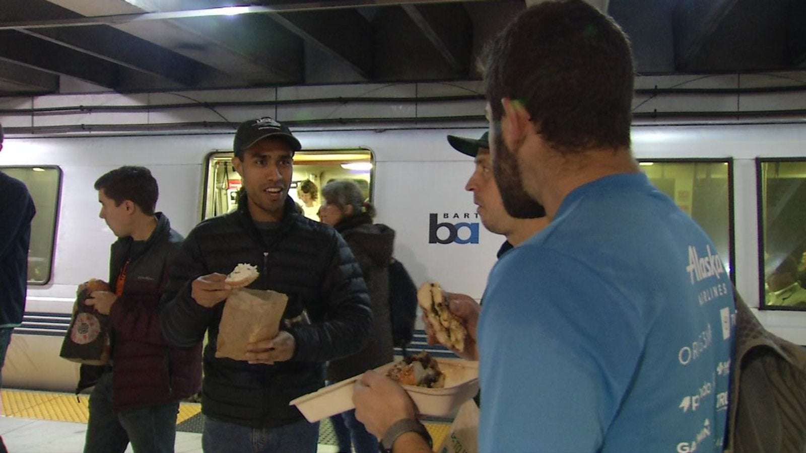 image for BART riders hold lunchtime 'eat-in' protest after man detained for eating sandwich on platform