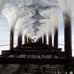 image for If you turn the "Frozen water under a pier" photo upside down it turns into an industrial cityscape.