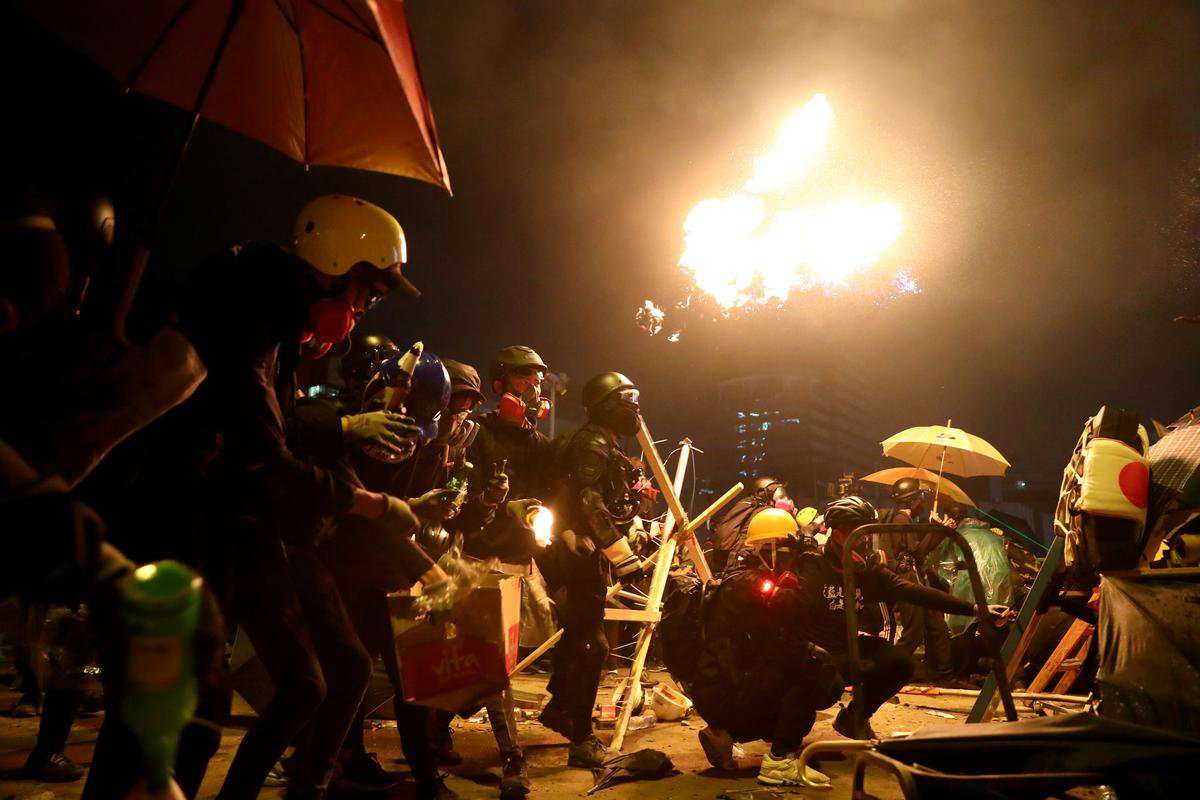 image for Hong Kong campus protesters fire arrows as anti-government unrest spreads