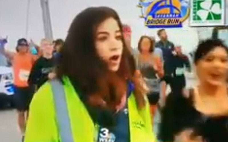 image for Runner who slapped TV reporter’s behind is banned from future races