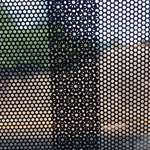 image for Overlapping circles on a bus window ad