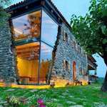 image for This wonderful double floor glassed corner on this modern stone house