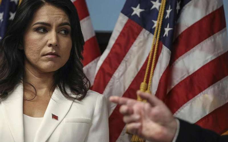 image for Tulsi Gabbard missed 85% of House votes this fall. Hawaii's ex-governor wants her to resign