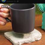image for That is an actual piece of bread.. covered in cement, being used as a table coaster...
