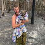 image for This is Patrick Boyle. He went around Mallacoota searching for injured wildlife. Pictured is one of the koalas he had rescued. Shoutout to the fucking legend.