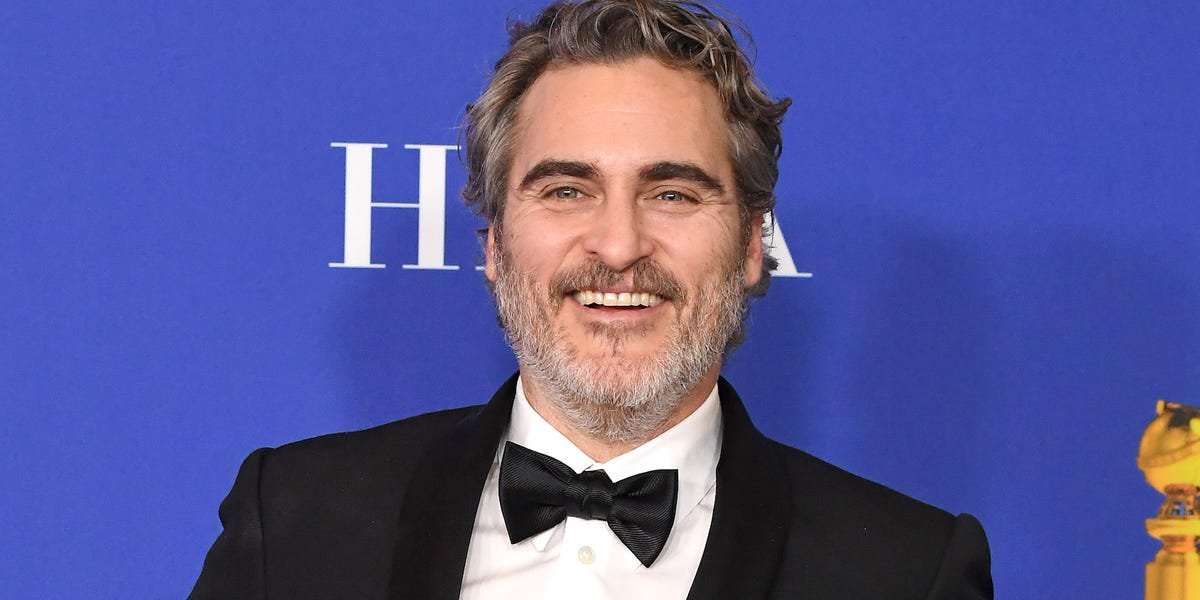 image for Joaquin Phoenix will wear the same tuxedo for every awards show this year to 'reduce waste'