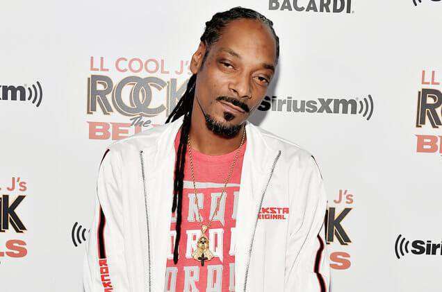 image for Snoop Dogg Employs A ‘Professional Blunt Roller’