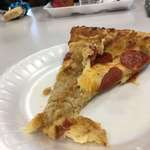 image for My school gave rotten/undercooked pizza? Tons of people spat it out, and it smelled atrocious.