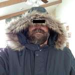 image for I liked my $30 Walmart coat until I tried to use the hood this morning. There is no drawstring; this is where the hood settles no matter what I do. Black bar for to keep identity secret.