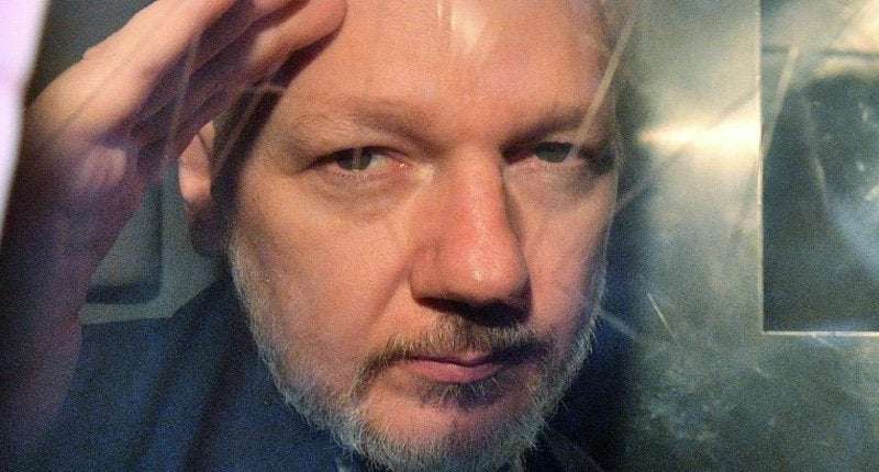 image for Julian Assange says he was promised a Trump pardon if he would lie about Russia’s DNC hacking