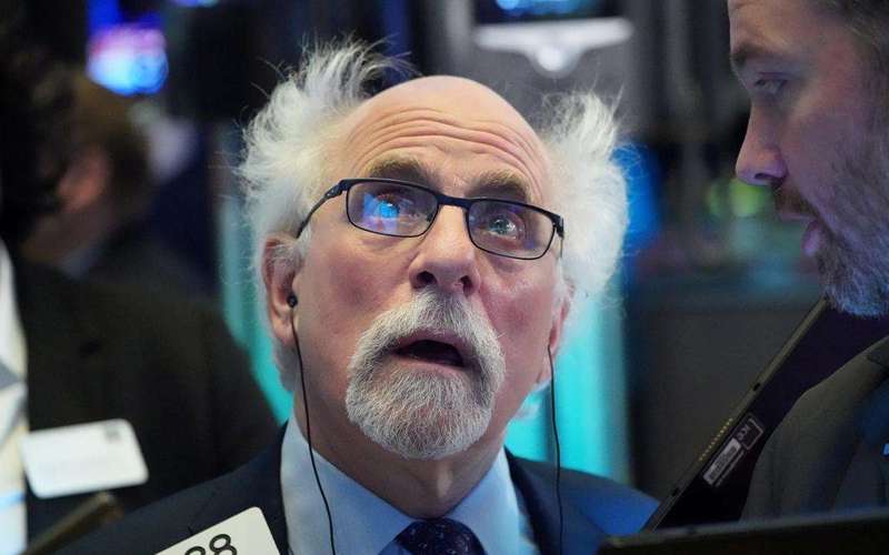 image for Wall Street clobbered as crude plummets, virus crisis deepens