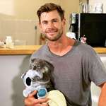 image for Picture of Chris Hemsworth with a baby koala saved from the flames of the fires in Australia.
