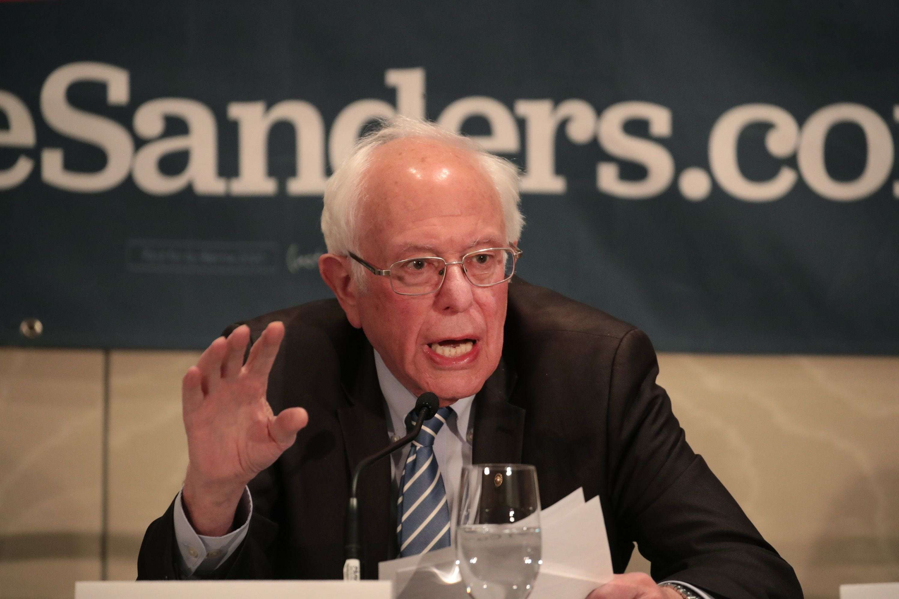 image for Bernie Sanders says he's staying in race, looks forward to debating Joe Biden