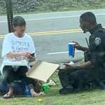 image for A police officer in North Carolina spent his lunch break sharing pizza with a homeless woman.