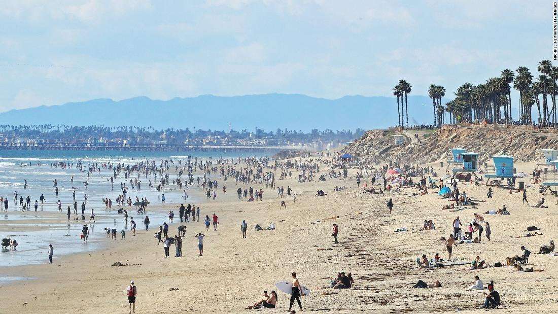 image for Crowds packed California beaches despite shelter in place order