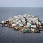 image for Migingo Island, population of 131, only 0.0008sq mi of dirt
