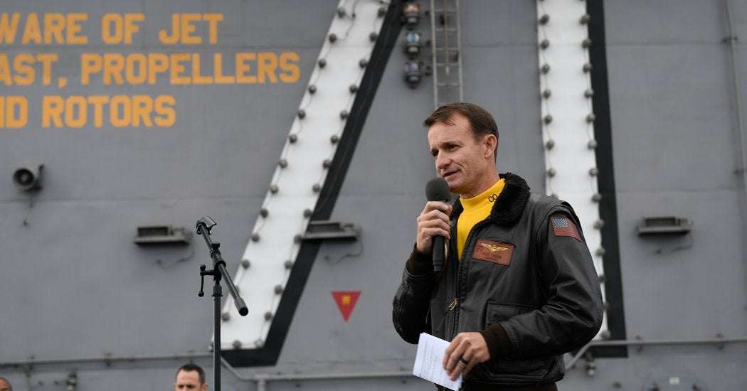 image for Navy Captain Removed From Carrier Tests Positive for Covid-19