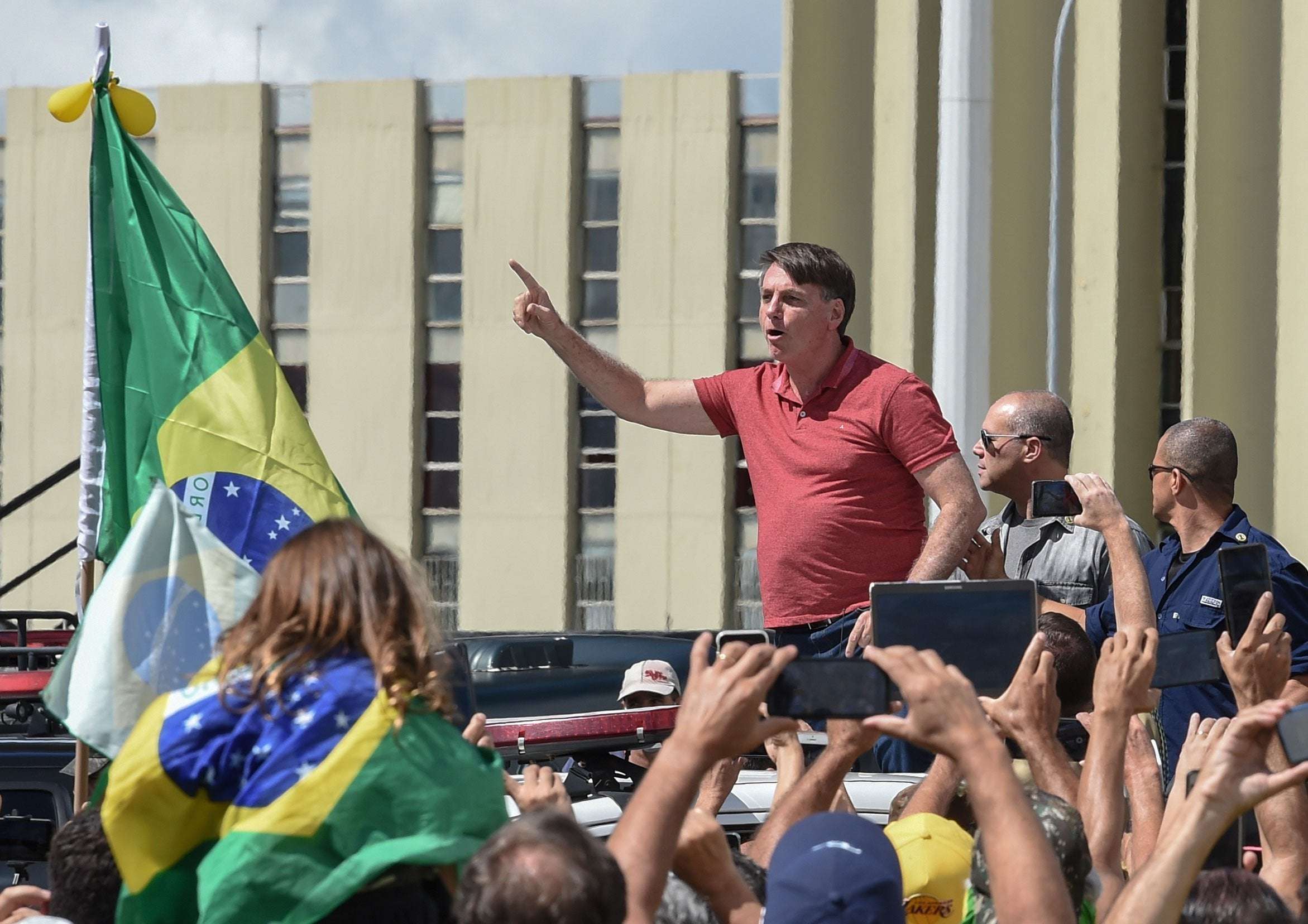 image for Brazil's President Jair Bolsonaro joined a rally to end quarantine measures