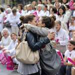 image for Two woman kiss in front of an anti-gay protest in 2012