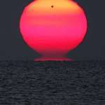 image for Venus passing the sun during dawn in the Caribbean