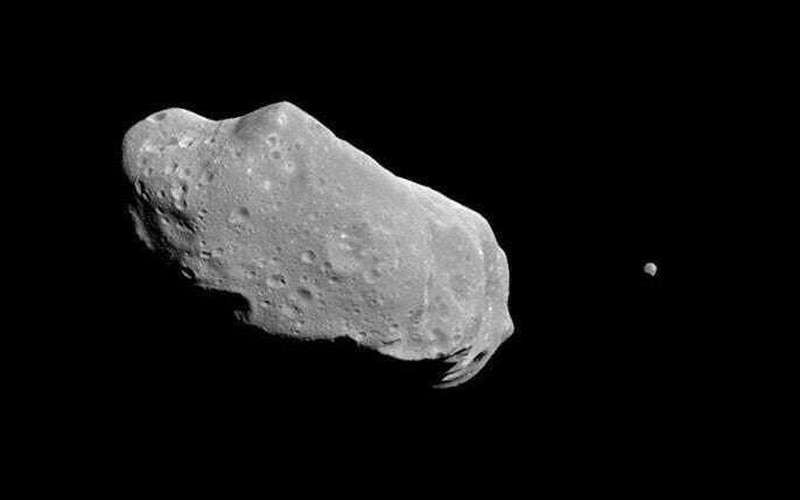 image for Asteroid sneaks past satellites in one of the closest flybys on record