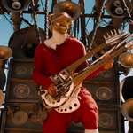 image for In Mad Max: Fury Road (2015), there is a character called the Doof Warrior that rides a van made out of amps while playing an electric guitar that shoots fire. I don’t have anything else to add but remember that shit? That movie fuckin ruled, let’s watch it