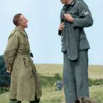 image for 7'3'' jakob nacken (221 cm) the tallest nazi soldier ever chatting with 5'3'' (160 cm) canadian corporal bob roberts after surrendering to him near calais, france in september of 1944 (colorized by me) [1434x1976]
