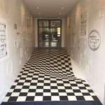 image for This optical illusion was made with 400 individual tiles and was designed to stop people from running in the hallway.