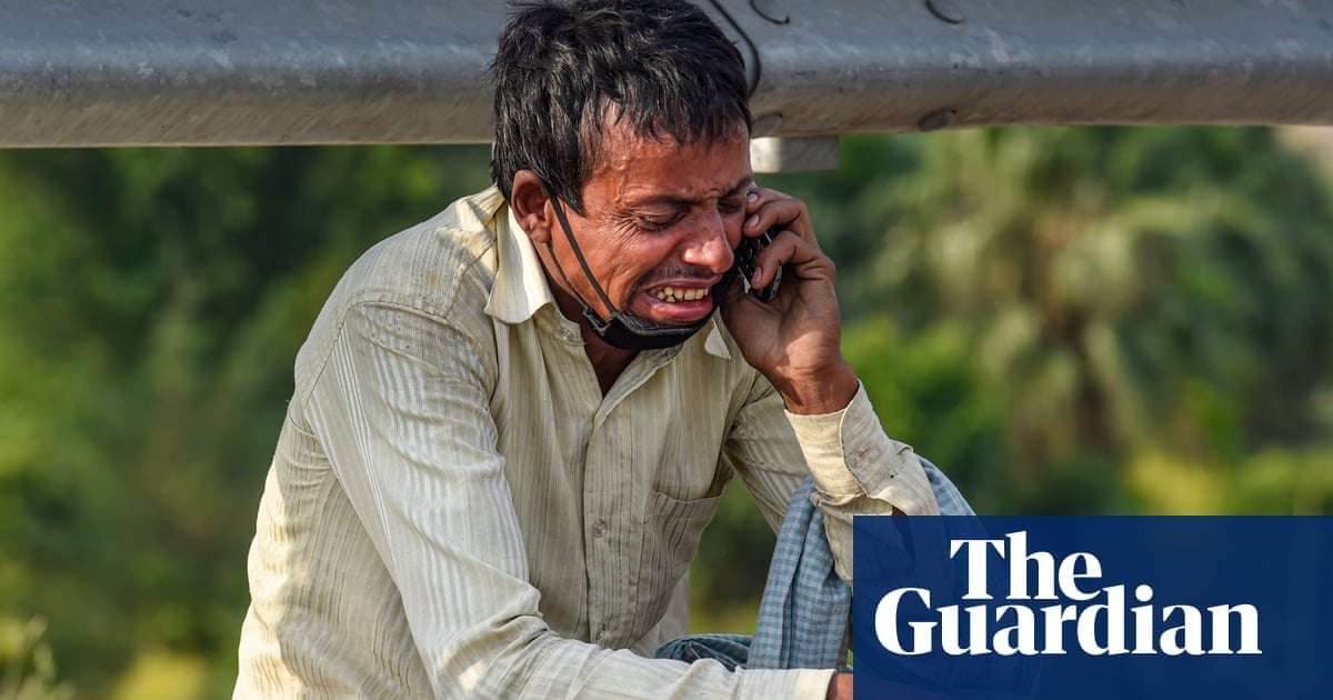 image for ‘My angel’: man who became face of India’s stranded helped home by stranger