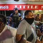 image for Tell this story. A group of black men ensure no harm comes to a police officer in Louisville riots.