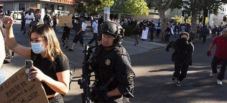image for Thousands Demand Firing of San Jose Cop Filmed Antagonizing, Swearing at Protesters