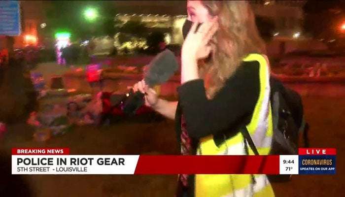image for Officer who fired pepper balls at news crew during Louisville, Ky., protest reassigned pending investigation