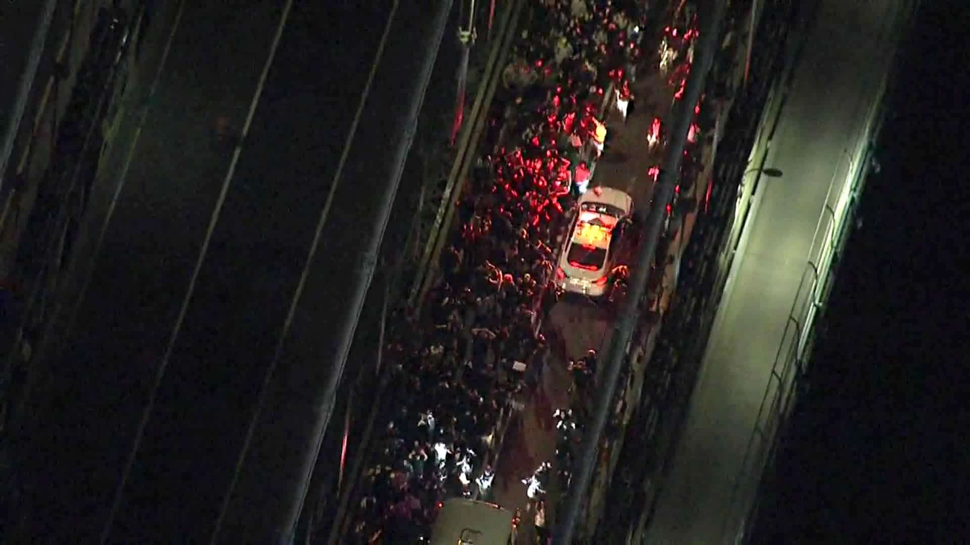 image for New York protesters are trapped on the Manhattan Bridge with police waiting on both ends