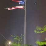 image for In a strikingly poignant metaphor, the largest free-flying American flag in the country was torn apart last night during severe thunderstorms in Sheboygan, WI.