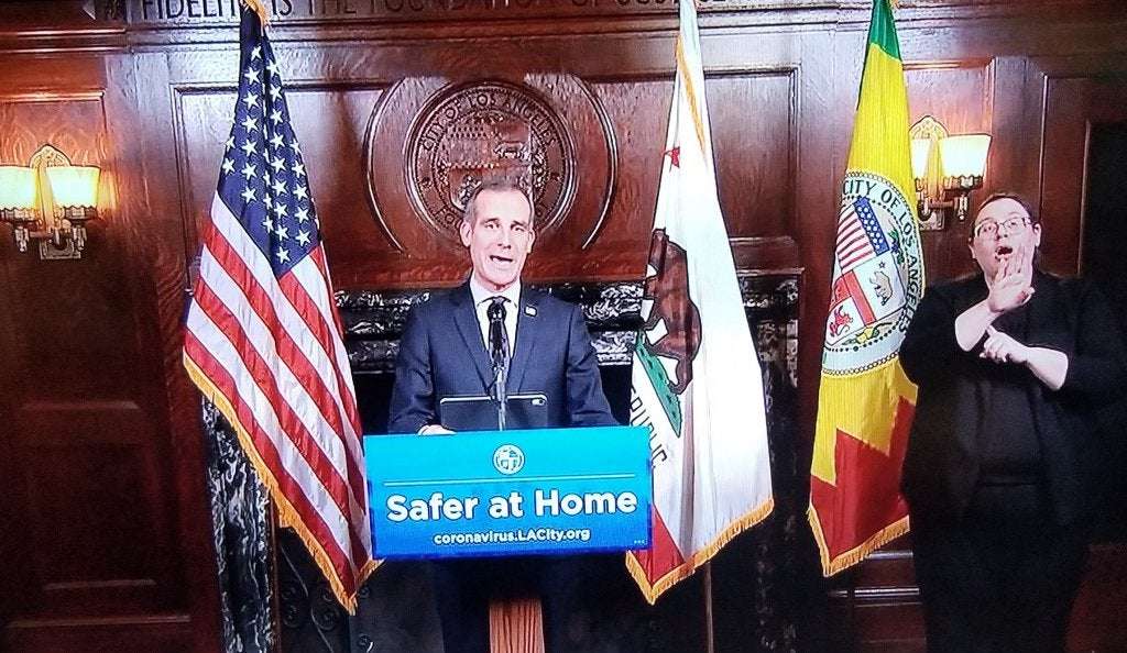 image for Los Angeles Mayor Eric Garcetti, City Officials Cutting $100 Million-$150 Million From LAPD Budget, Funds To Be Reinvested In Communities Of Color